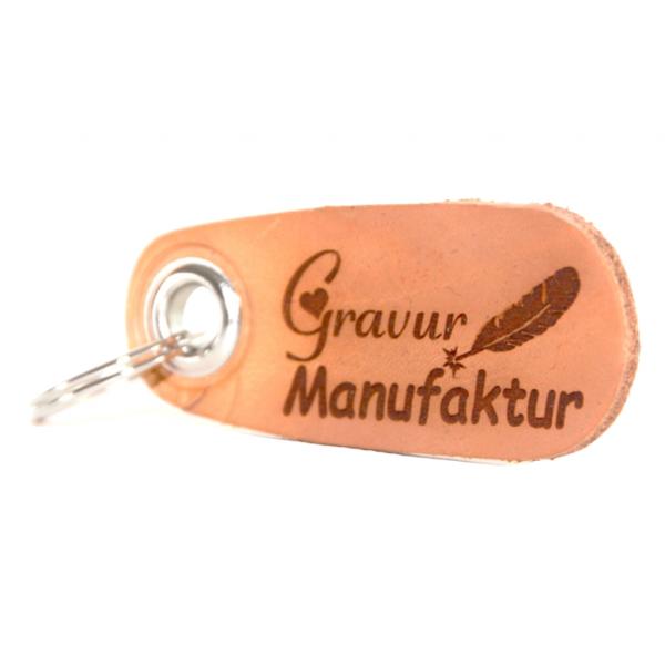 Beiger ovaler Lederschlüsselanhänger mit Namens Gravur